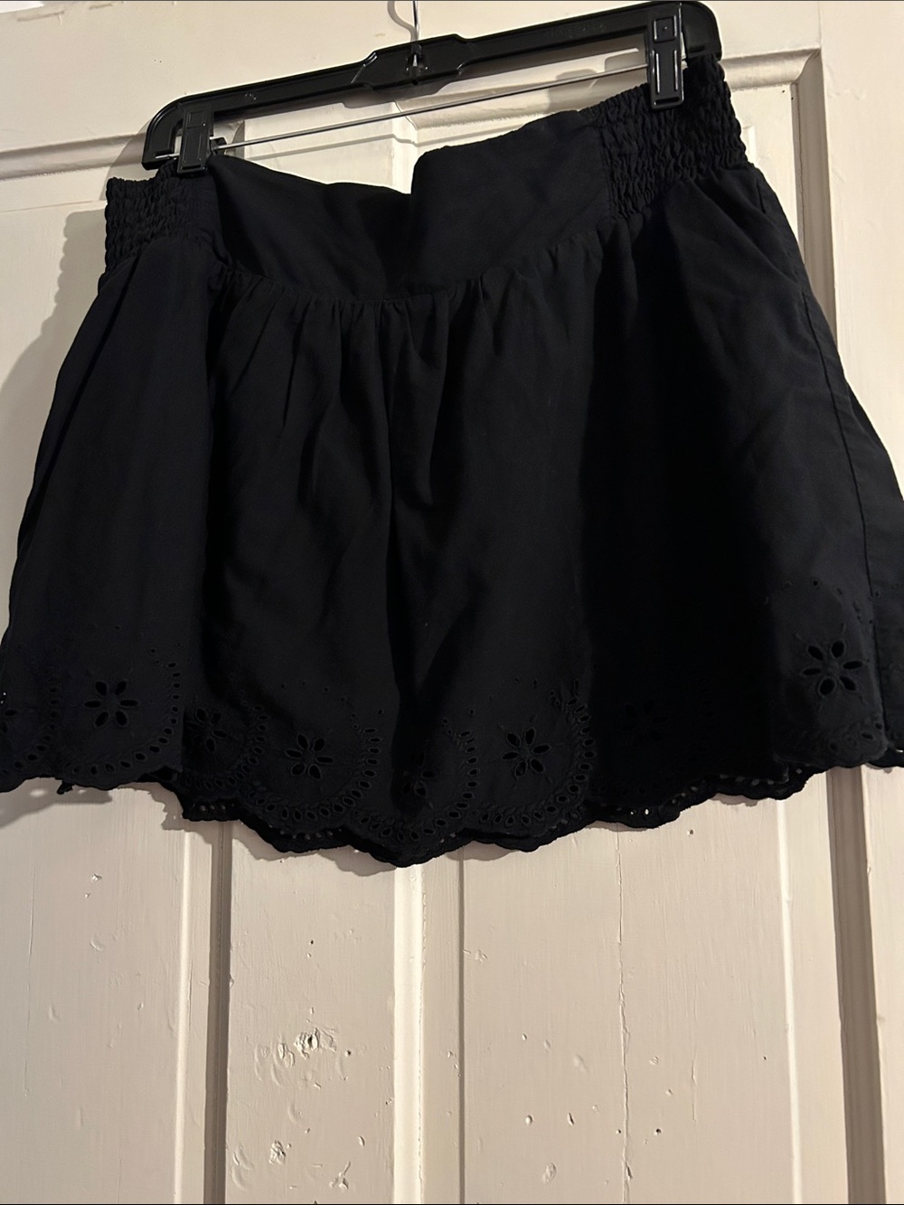 No Boundaries Black Mini Skirt with Eyelet Hem